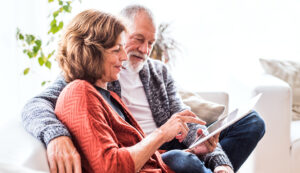an image of an older couple reviewing a pamphlet