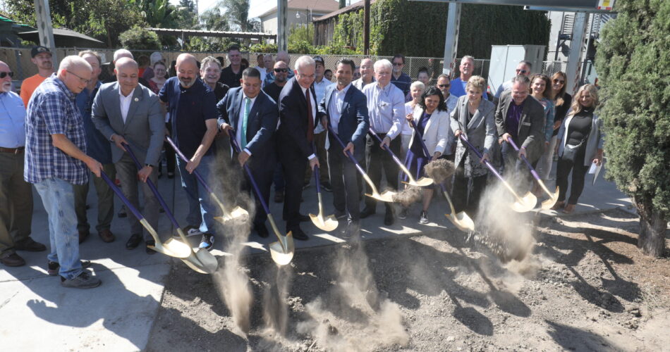 Health Plan of San Joaquin and San Joaquin County leaders digging into a new construction site.