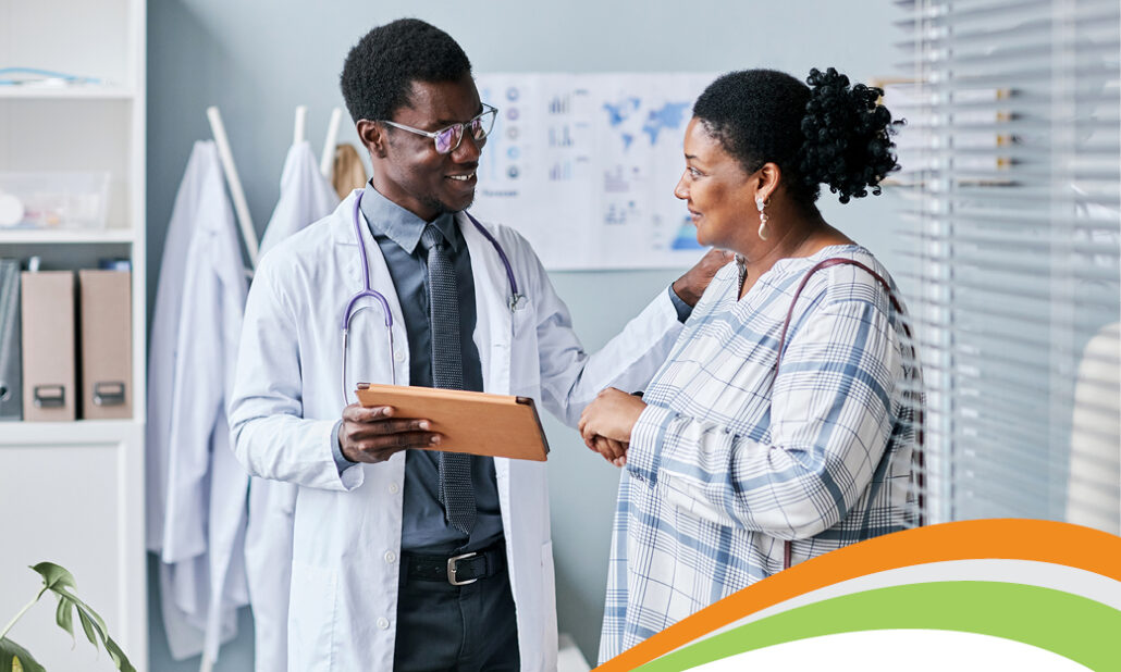 A patient visiting with her doctor